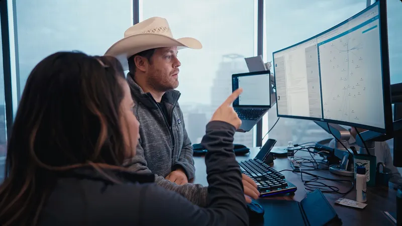 Team reviewing performance dashboards at a workstation