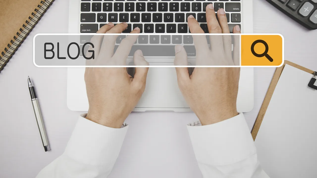 Hands typing beneath a blog search field