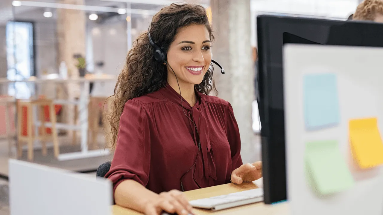 A sales representative sharing a testimonial video during a customer call