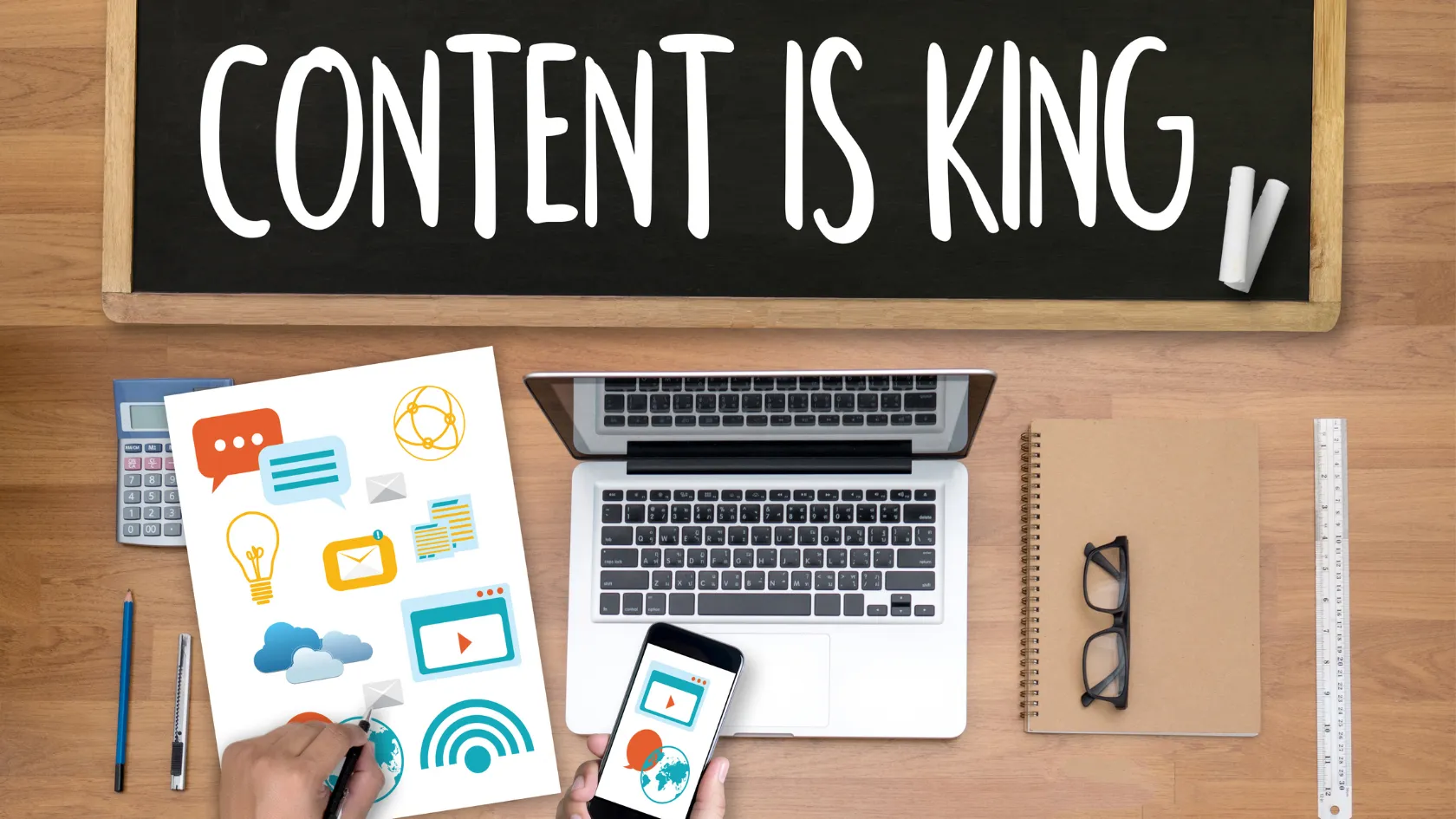Content marketing workspace beneath a Content Is King sign