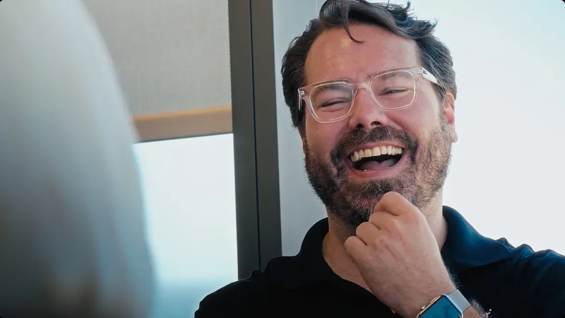 Customer laughing naturally during an interview